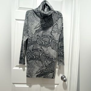 White House Black Market snakeskin print long sleeve high zip neck tunic.